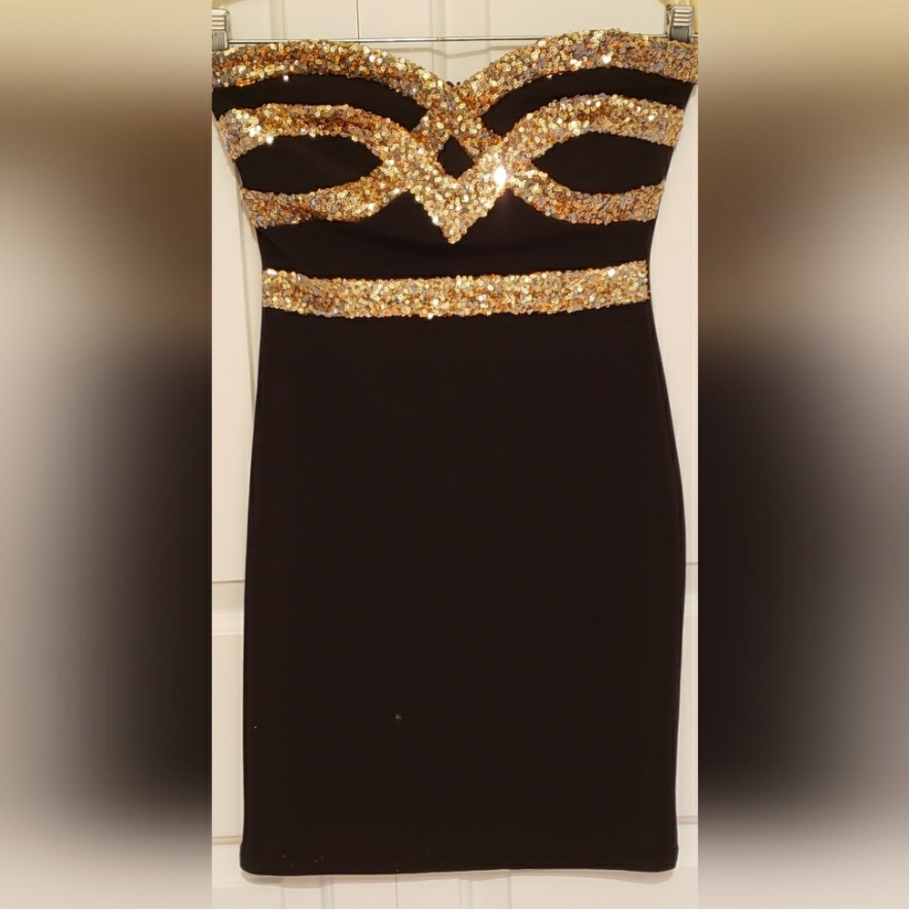 SOLD Black Mini with Gold Details